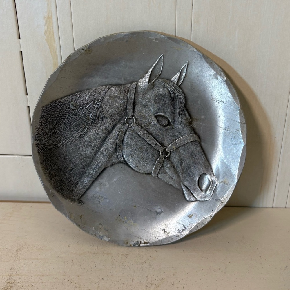Wendell August hand carved horse coaster.
